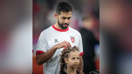 المشهد المعاصر | علي علوان يخطف الأنظار في لقطة جميلة مع طفلة روسية قبيل مباراة الأردن وروسيا